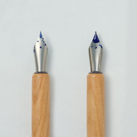 Enjoy the smooth writing feel of a fountain pen in a maintenance-free nib. When you’re done writing, simply rinse with water and dry. An ideal first nib for those new to bottled ink.

The nib is carefully aligned by hand to achieve superior ink retention, allowing about a sentence of writing with each dip. Developed specially for writing, the design replicates the form of the fountain pen nib, while rigorous testing ensures the nib won't catch on paper.

Stainless steel, iridium (nib point)

Use and Care:

