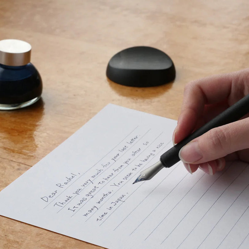 Enjoy the smooth writing feel of a fountain pen in a maintenance-free nib. When you’re done writing, simply rinse with water and dry. An ideal first nib for those new to bottled ink.

The nib is carefully aligned by hand to achieve superior ink retention, allowing about a sentence of writing with each dip. Developed specially for writing, the design replicates the form of the fountain pen nib, while rigorous testing ensures the nib won't catch on paper.

Stainless steel, iridium (nib point)

Use and Care:

