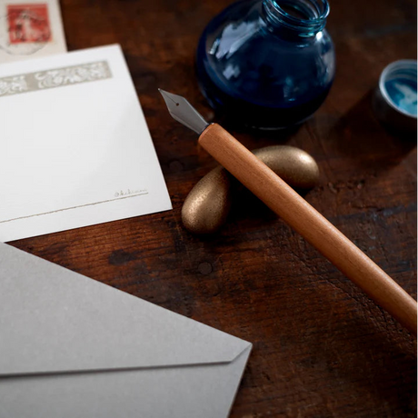 Our Hasami ware pen rests are inspired by the natural form of droplets. Four distinctive colours have been specially selected from an extensive variety of glazes. The soft contours gently guide and hold your pen in place.

Four colours were chosen to celebrate the unique richness of Hasami porcelain and glazes.

The golden glaze has an unassuming presence when raw. The unique and variable nature of pottery work is evident here with the finished colouring dictated by the position inside the kiln and revealed