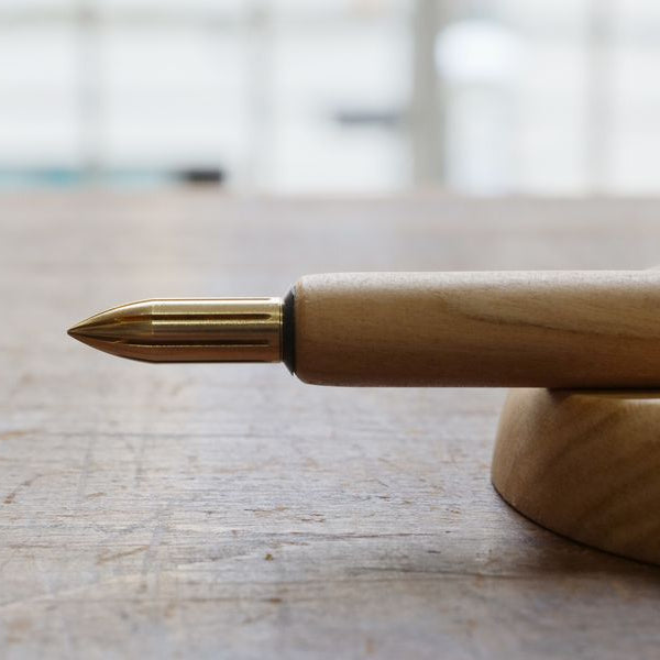 Experience the feel of natural wood. Japanese cherry is known for its reddish colour that deepens over time, allowing you to enjoy your pen’s unique transformation. An ink-resistant finish ensures practicality while maintaining the natural appeal of wood.

A nib holder crafted from Japanese cherry. Designed for ease of writing, the 7-inch length fits comfortably in the hand like a standard pencil. Partner with your favourite nib, or switch nibs to suit your mood. Fits most nibs as well as those from our ran