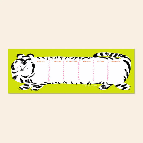 Karen Schipper Weekly Desk Planner - Tilda Tiger

Add bold, playful energy to weekly planning with the Tilda Tiger Desk Planner, an illustrated weekly planner pad featuring a striking tiger design with each section labeled for the days of the week. The long horizontal format makes it both eye-catching on a desk and practical for mapping out tasks, appointments, and weekly reminders.

It comes with 52 undated sheets, enough to last you the year.
Professionally printed full color
Size: 11.75 x 4.25 inches
52 