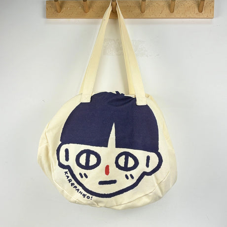 Karepango Haya: Large Zipper Tote Bag

Our signature tote bag with a signature face. Stand out with true character. Zipper closure on top.