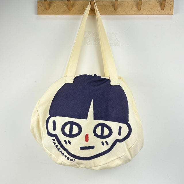 Karepango Haya: Large Zipper Tote Bag

Our signature tote bag with a signature face. Stand out with true character. Zipper closure on top.