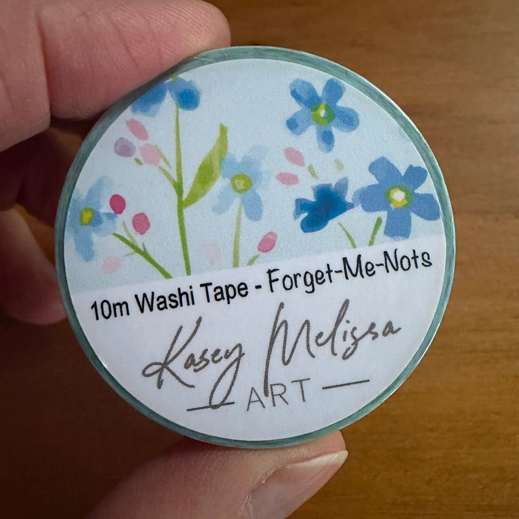 Loose watercolor forget-me-not flowers light blue background washi tape. Add a bit of soft watercolor art to your journal, letters or scrapbooking.

• 15mm wide
• 10 Meters long
• Printed label
• Shrink wrapped
• designed by Kasey

All images and art copyright Kasey Melissa Art