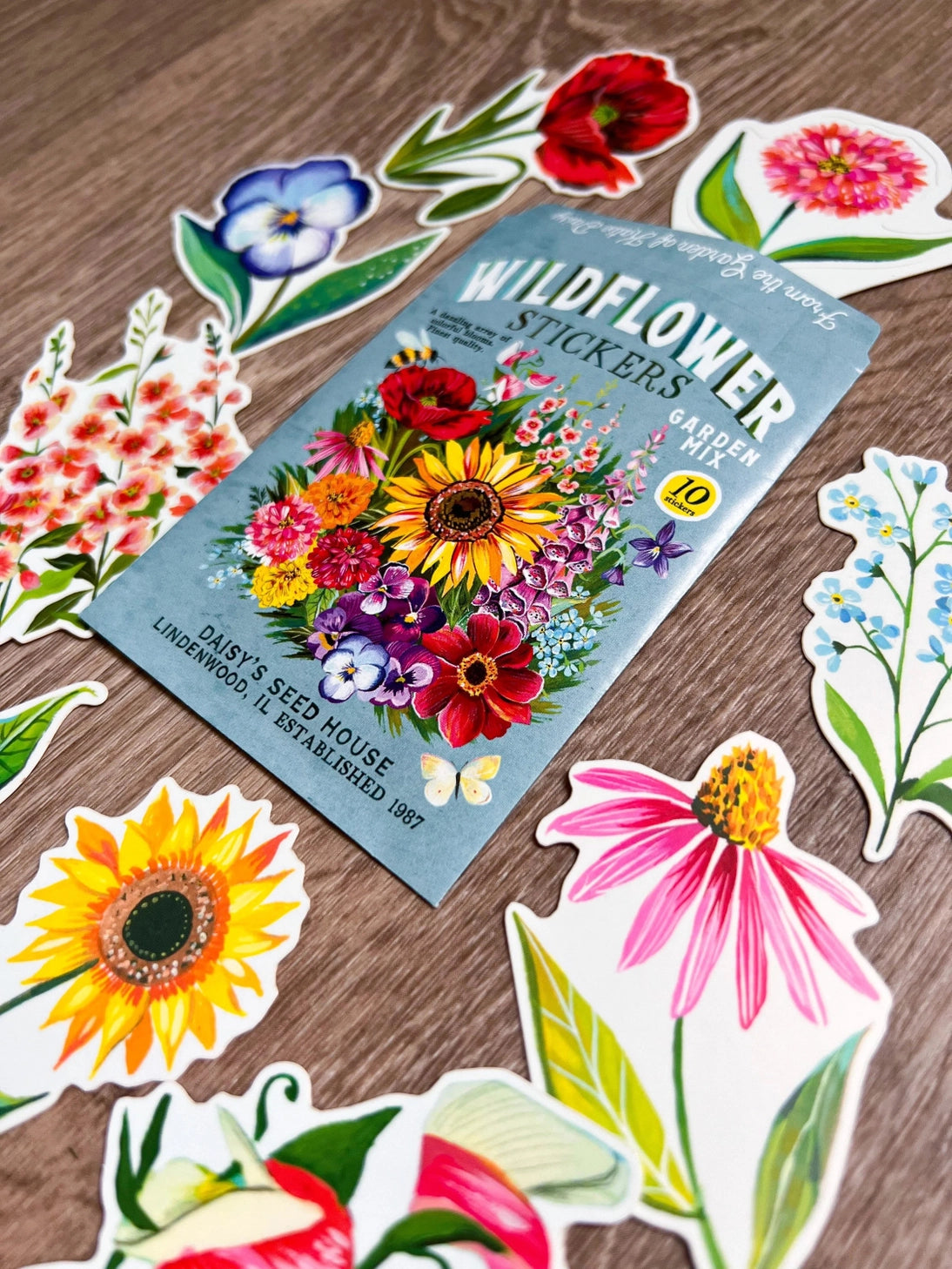 Wildflower Sticker Pack - Set of 10 Matte Stickers by Katie Daisy

From The Garden of Katie Daisy:

Adorn your laptop, water bottle, packages and so much more with this set of vibrant wildflower STICKERS!! You'll receive 10 floral stickers in a seed packet! (This listing is not for wildflower seeds ;) )