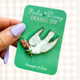 A tiny treasure to pin on your jacket, tote, or favorite old flannel—each one a little love letter to country delights, small joys, and the art of noticing.

Details:
• 1.75” on the longest side
• Gold-plated finish
• Rich, detailed UV printing
• Double pin posts with sturdy metal backings
• Mounted on a backing card


Designed with love in my Oregon studio. Manufactured in China.
Collect them all or gift one to a kindred spirit. 🌸