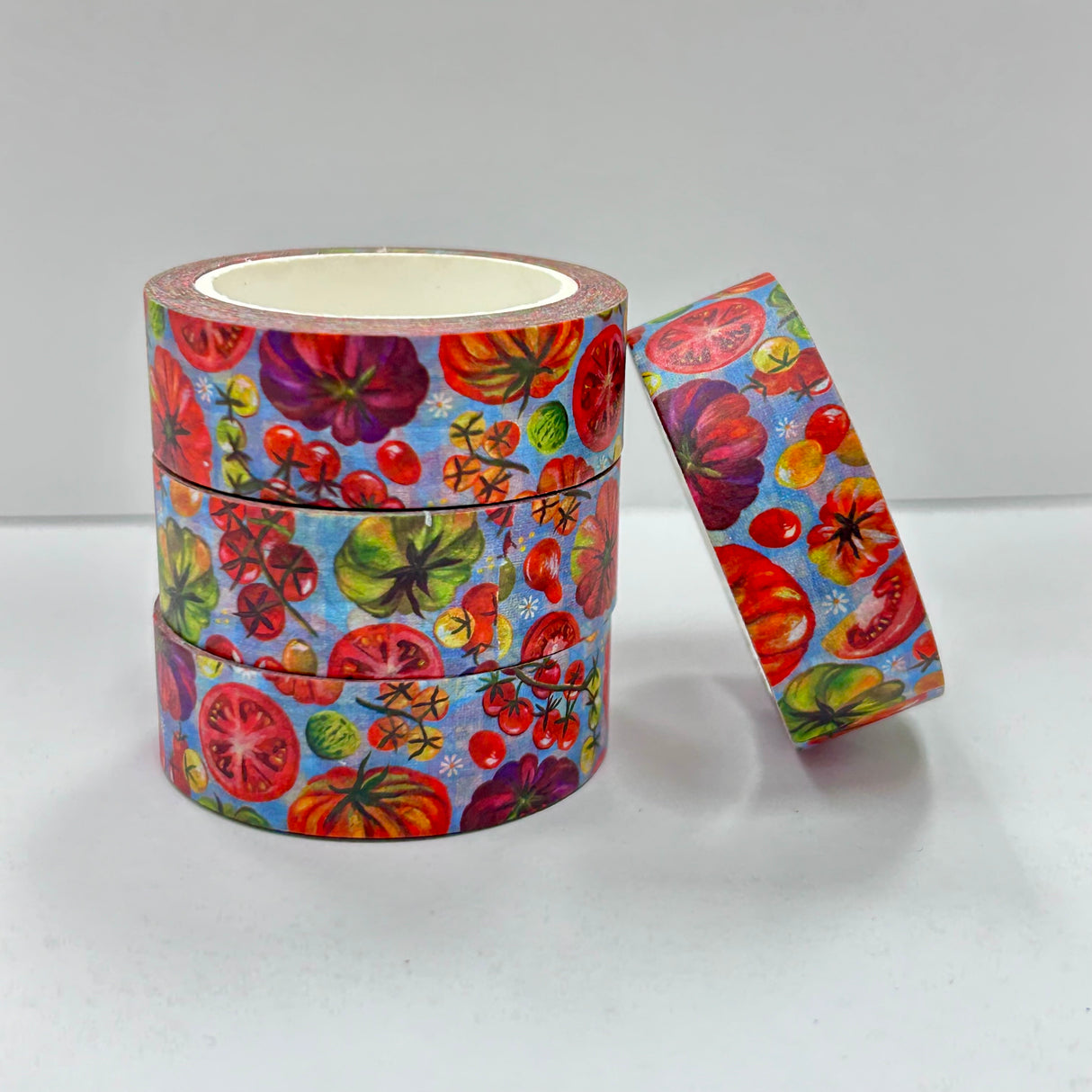 Katie Daisy Washi Tape - Tomatoes

There are so many uses for washi tape! You can use it for scrapbooking, gift wrapping, and even home decor projects :) Add some extra charm to your letter-writing, use it to tack up photos... the possibilities are endless!

Include 1 roll of washi
Traditional washi tape, printed on rice paper
Each roll is 15mm wide, 10m long, and the pattern reprints every 350mm.
Semi-transparent&nbsp;