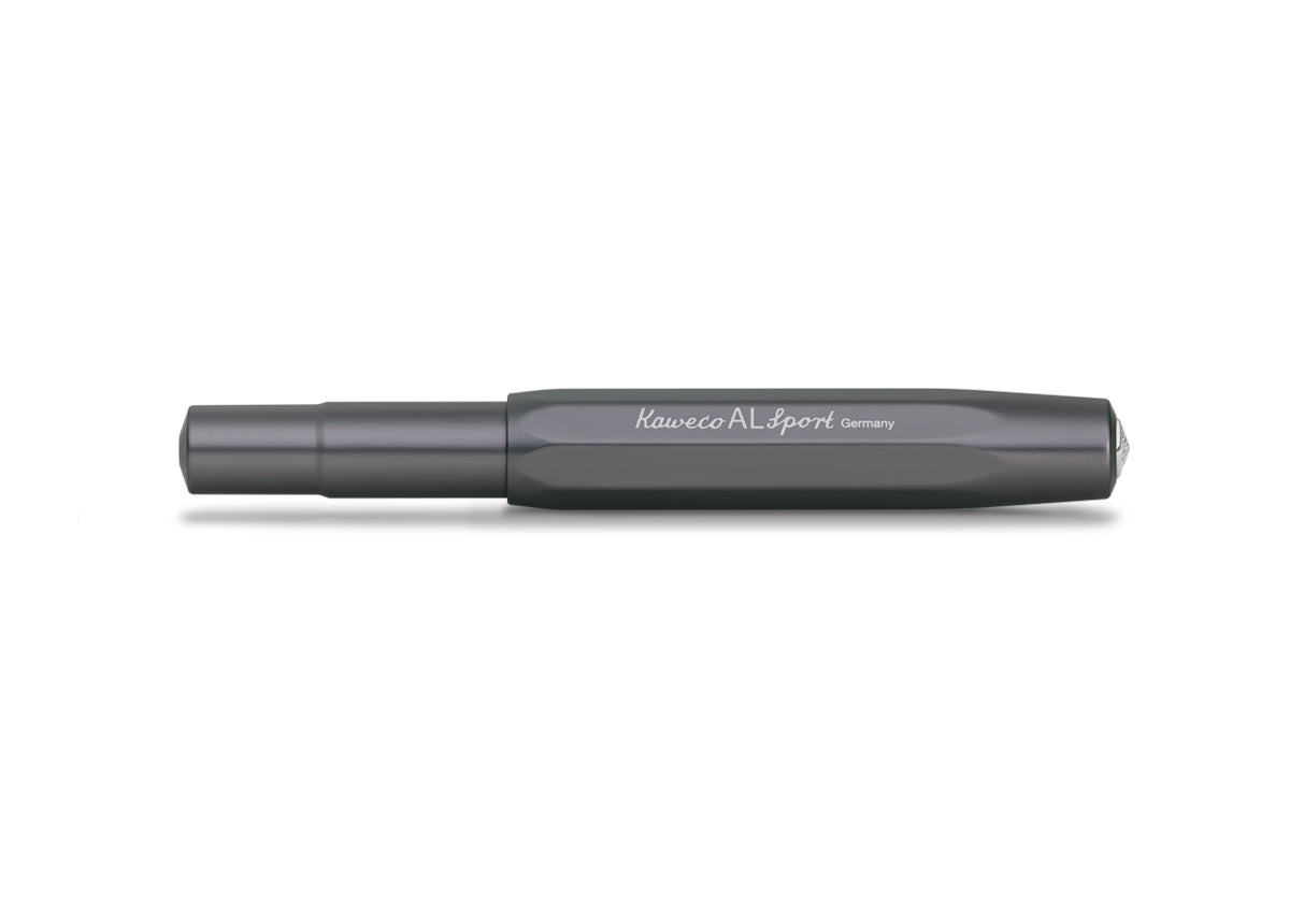 Our AL Sport fountain pen anthracite is a pen to behold. The silky, glossy surface in a warm grey tone has an expressive and noble appeal. It is a perfect accessory for everyday use in the office, daily life, and leisure.

The metallic body is made of high-quality aluminium and grants an unique haptic experience. Its fine surface imparts elegance.

This pocket fountain pen only measures 10.5 cm when closed and is, therefore, a perfect everyday pen. When the cap is attached, the pen grows to a standard size 
