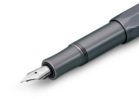 Our AL Sport fountain pen anthracite is a pen to behold. The silky, glossy surface in a warm grey tone has an expressive and noble appeal. It is a perfect accessory for everyday use in the office, daily life, and leisure.

The metallic body is made of high-quality aluminium and grants an unique haptic experience. Its fine surface imparts elegance.

This pocket fountain pen only measures 10.5 cm when closed and is, therefore, a perfect everyday pen. When the cap is attached, the pen grows to a standard size 