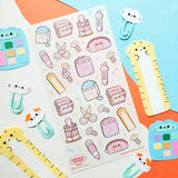 @catsoul_draws has put together the sweetest set of supplies, where even the stationery comes with whiskers and toe beans! From paw-print box cutters and cat-shaped rulers to notebooks, scissors, calculators, and washi tape, these kawaii supplies are here to make any workday a little more pawsitive.

Art by: @catsoul_draws


One sticker sheet is included.
Top Coating: None
Adhesive Layer: Paper
Backing Layer: Clear PET 
Size: 6.69"x3.54"
Weight-0.03oz