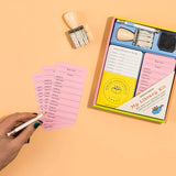 Run your own library at home with all your favorite books! This activity kit makes it fun & easy to share books with friends (or siblings or even grownups!). Just stick the special pocket inside any book you plan to lend and use the checkout card & official date stamp to mark the day you want it back— boom, you’re a librarian! Because loving books is cool and losing track of ’em is not.