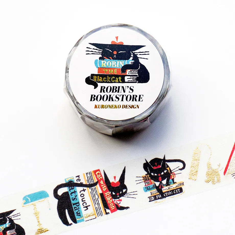 Robin-chan, the black cat, seems to be at a stylish bookstore this time.&nbsp;The fine foil stamping on book spines and antique furniture is very beautiful. Cut short to use as stickers, or as a pop point in wrapping or decoration.


✨ Product Features

Gold foil stamping for a subtle, elegant shine
Perfect for decorating planners, journals, cards, gifts, and scrapbooks
High‑quality Cozyca Products washi tape
Size: 20 mm × 5 m