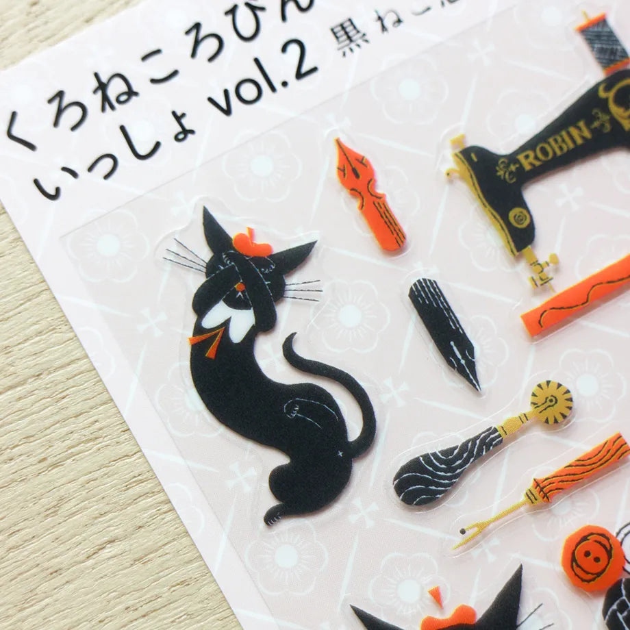 A sticker featuring a stylish black cat named 'Robin-chan' as the main character.
Robin-chan's pose, which gives off the unique softness of cats, is irresistibly cute.
The sewing machine, sewing kit, pen nibs, ink, sealing stamps, and other stylish items lined up are also stylish.


Printed on PET material, the stickers have a smooth, durable finish that’s easy to peel and place - great for both everyday use and special projects.

✨ Product Details

Smooth, durable PET sticker material
Perfect for planners,