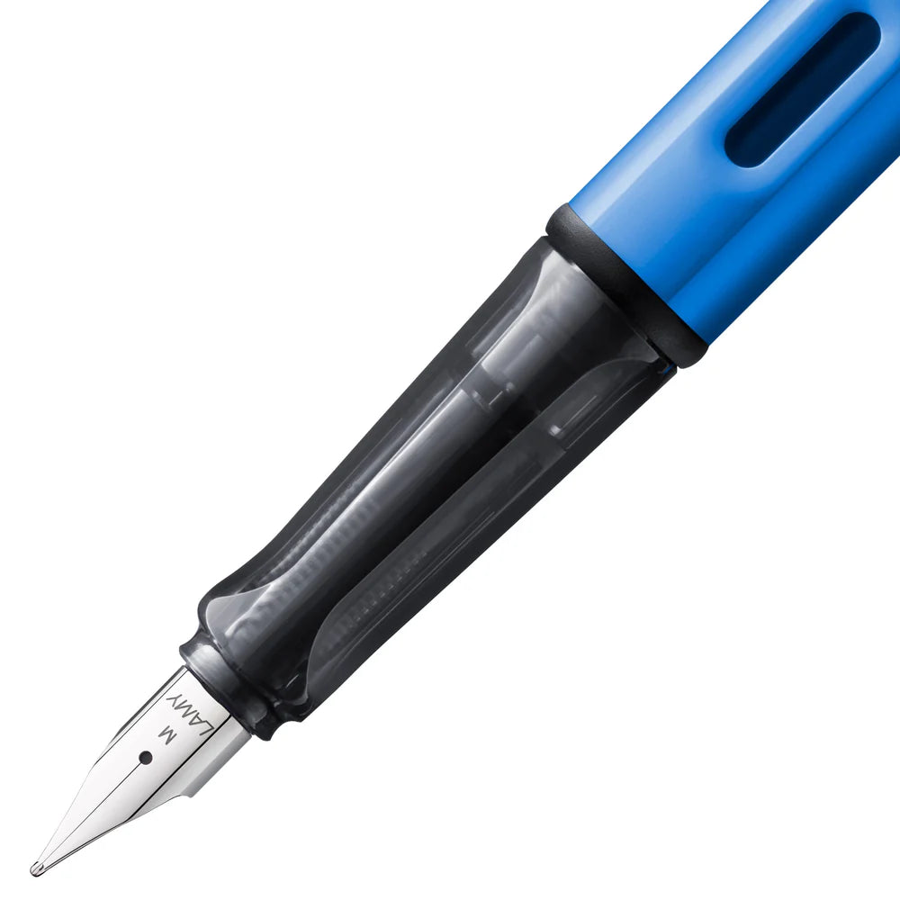 Light, lighter, LAMY AL-star: the writing classic made of resistant aluminium masters all challenges of everyday life in style. The transparent grip lies comfortably in the hand and, with an unobstructed view of the ink duct, turns the functional into a visual highlight. The series is ever inspiring with new special editions in current trendy colours and is thus an inspiring must-have in any pencil case.

Lightweight fountain pen with polished steel nib and ergonomic grip made of high-quality transparent pl