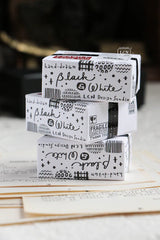 A mini package box full of black and white stickers!
How cute is that!
It has everything: a fragile sticker, shipping label, and even an invoice!
That invoice is also a sticker!