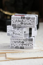 A mini package box full of black and white stickers!
How cute is that!
It has everything: a fragile sticker, shipping label, and even an invoice!
That invoice is also a sticker!