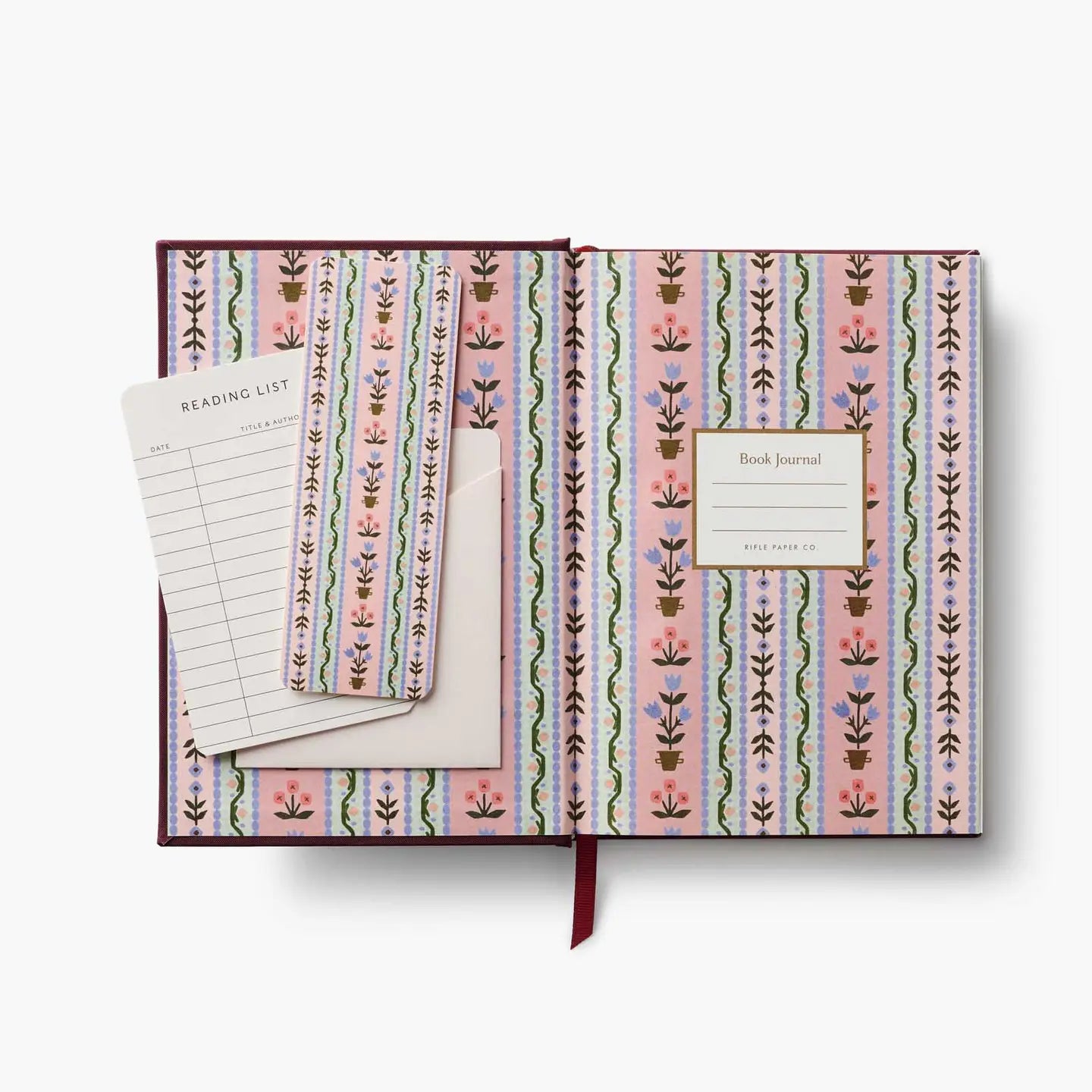 This embroidered-cover journal is designed with book lovers in mind. Perfect for logging reads and capturing reflections, the journal features useful sections for reading notes, review entries, books borrowed and lent, and a to-read list. Inside, you’ll also find a place-keeping ribbon and two paper bookmarks.