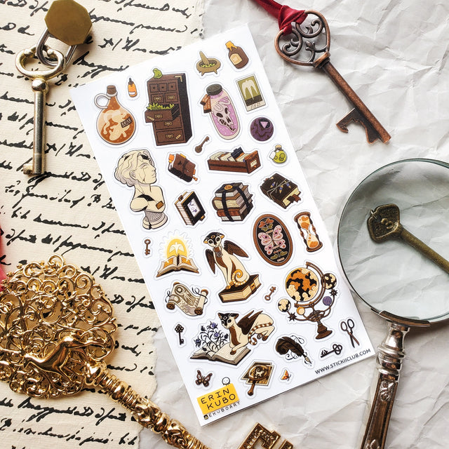 🗝📖 Explore @ekuboart’s magical study, filled with a treasure trove of curiosities. Whether you’re diving into literary classics or dabbling in spellwork, you’ll discover mysterious specimens in jars, a mythical cat guarding ancient tomes, skeleton keys, and countless wondrous oddities. One can only imagine the powerful magic that unfolds behind these closed doors!