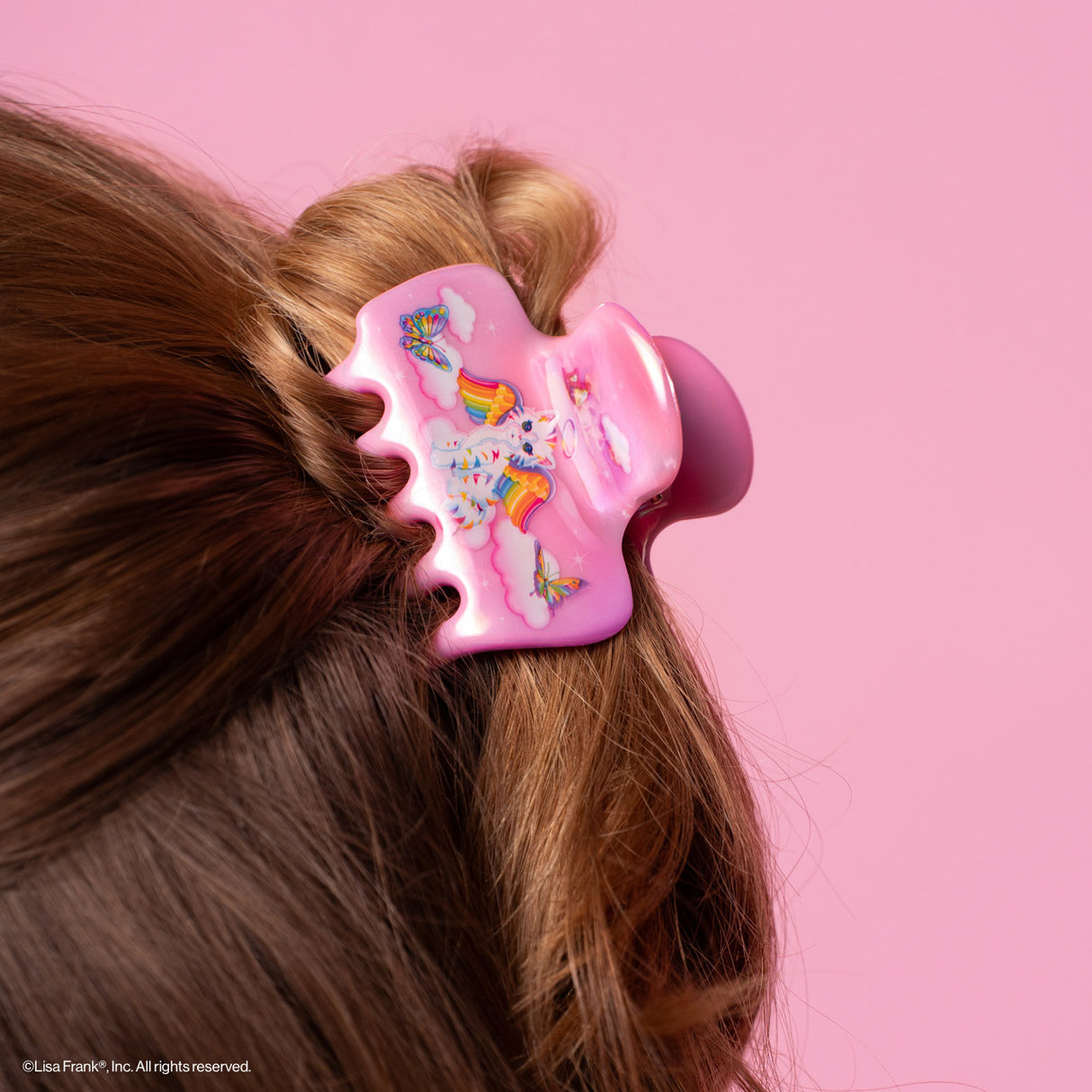 Add a splash of color to your style inspired by Lisa Frank® shinny cat Angel Kitty™

Great for half-up styles, buns, and everyday updos. Lightweight, durable, and easy to wear!