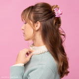 Add a splash of color to your style inspired by Lisa Frank® shinny cat Angel Kitty™

Great for half-up styles, buns, and everyday updos. Lightweight, durable, and easy to wear!