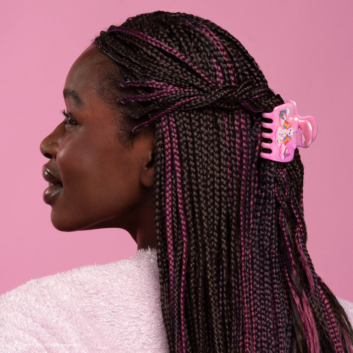 Add a splash of color to your style inspired by Lisa Frank® shinny cat Angel Kitty™

Great for half-up styles, buns, and everyday updos. Lightweight, durable, and easy to wear!