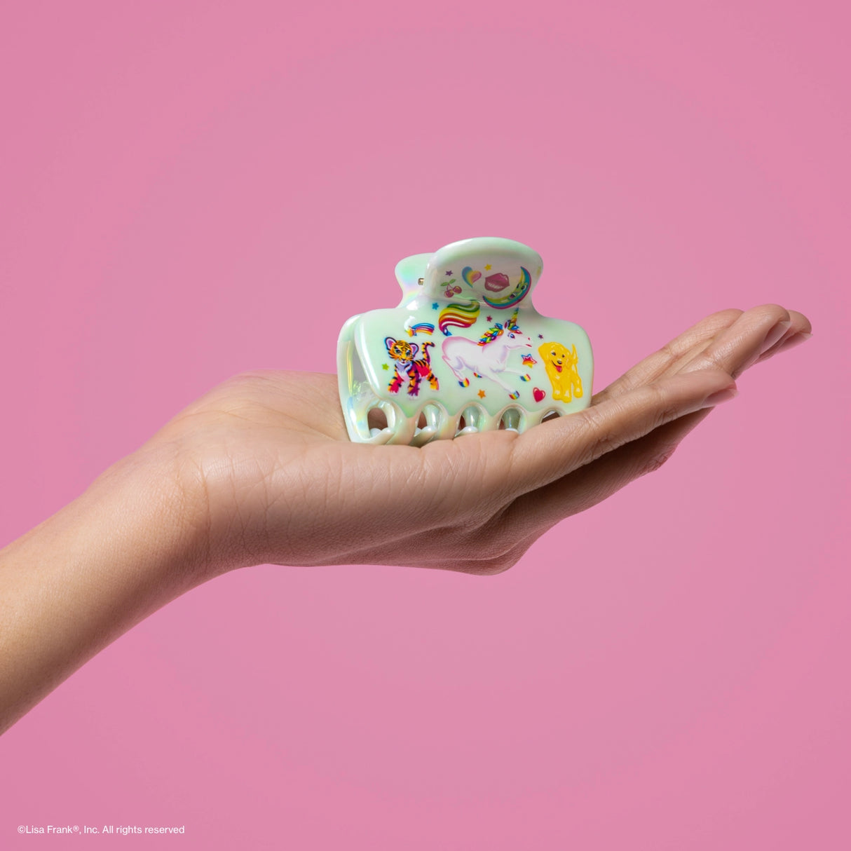 Add a radiant energy to your style inspired by Lisa Frank® colorful unicorn Markie™

Great for half-up styles, buns, and everyday updos. Lightweight, durable, and easy to wear!
