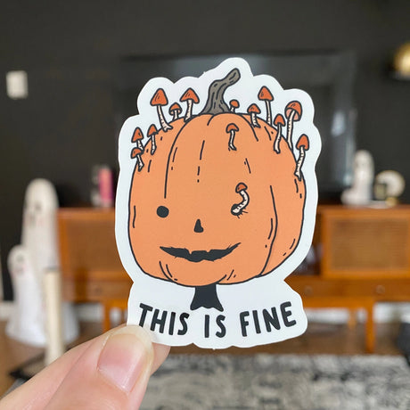 Little Spooky Studio - This Is Fine Pumpkin Vinyl Sticker

3 inch matte sticker of a rotting mushroomy pumpkin with the text "This is fine." underneath.