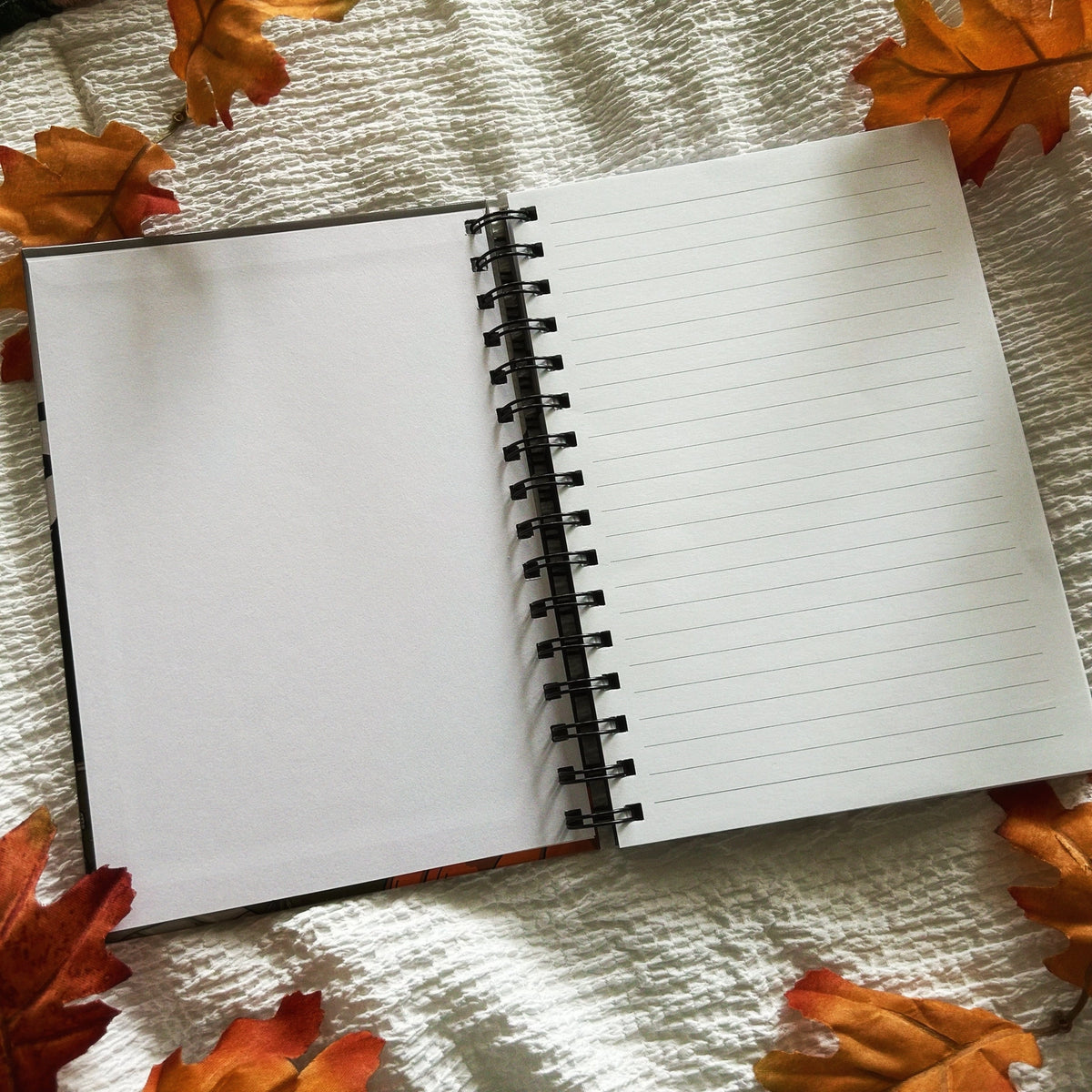 A new A5 notebook featuring a ghost dressing up as a witch!

This hardcover notebook comes lined and with an elastic band. There are 96 double sided pages.
