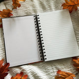 A new A5 notebook featuring a ghost dressing up as a witch!

This hardcover notebook comes lined and with an elastic band. There are 96 double sided pages.