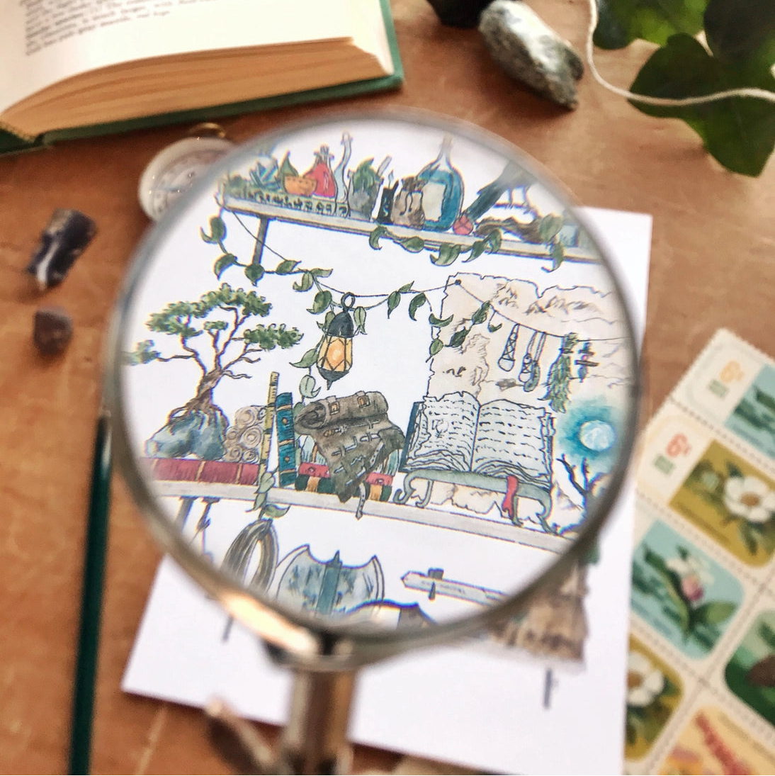 Postcard featuring my original watercolor and ink illustration of the oddities and books tucked away in the shelves of an intrepid adventurer, including a tiny dragon and a rather talkative raven.

• Printed on high quality card stock
• Each postcard measures 4.25 x 5.5" (A2)
