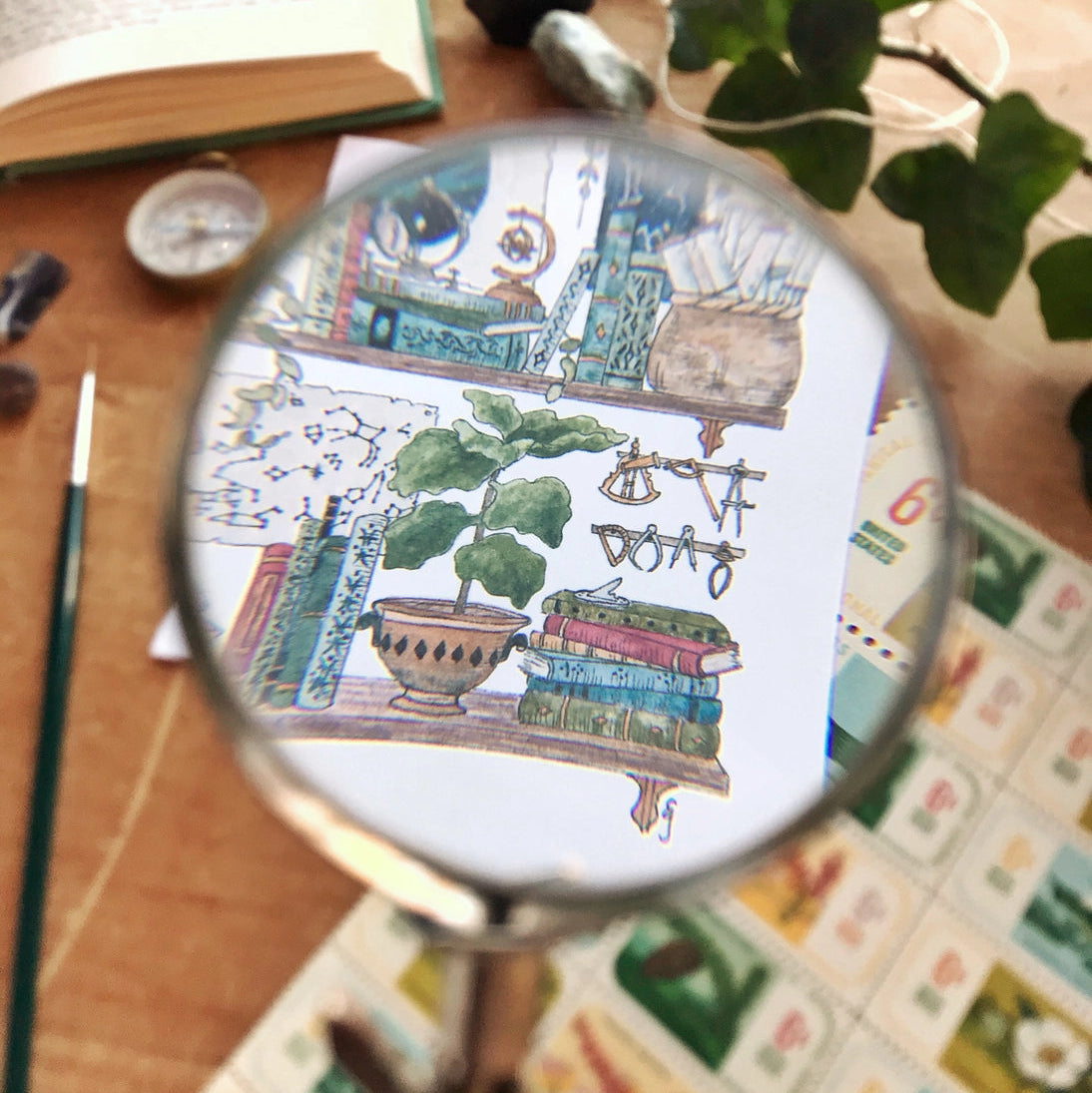 Postcard featuring my original watercolor and ink illustration of the oddities and books tucked away in the shelves of an inquisitive astronomer, including several star charts and a sleeping cat.

• Printed on high quality card stock
• Each postcard measures 4.25 x 5.5" (A2)