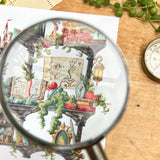 Postcard featuring my original watercolor and ink illustration of the various enchanted items collected by a storybook witch as she travels throughout all your favorite fairytales, including a charming castle, a glass-encased rose, and a brightly colored dragon, all nestled on stone shelves that evoke mysterious castle corridors covered in rose vines.
