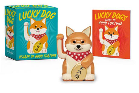 Lucky Dog figurine with packaging and guidebook on a white background