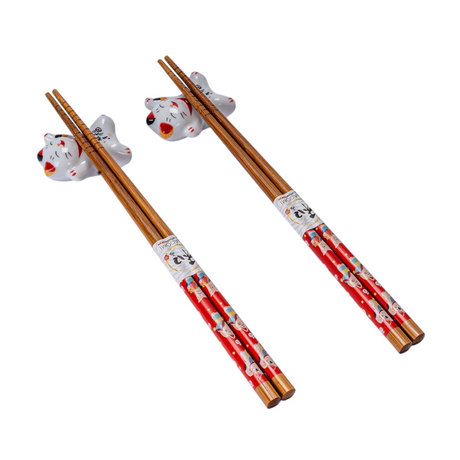 Lucky Cat Neko 2 Pair Chopsticks and Chopsticks Rests

This adorable box set includes 2 sets of matching chopsticks and chopstick rests.&nbsp;

Size: 9 inch chopsticks, 2.25 inches W chopsticks rest
Material: Bamboo and Ceramic
Origin: China