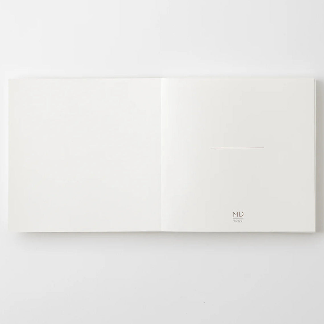 Crafted in Japan, this minimalist notebook is designed to enhance your writing experience. Inside, you'll find the high-quality Midori Diary (MD) paper, first developed in 1960 and refined ever since. Midori has rigorously tested this paper with various writing instruments to ensure quality, checking for ink feathering or bleeding, drying time, the smoothness of pen tips on the surface, and the tactile feel. The result is a paper that resists bleeding and feathering and is fountain-pen friendly, ensuring a 