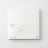 Crafted in Japan, this minimalist notebook is designed to enhance your writing experience. Inside, you'll find the high-quality Midori Diary (MD) paper, first developed in 1960 and refined ever since. Midori has rigorously tested this paper with various writing instruments to ensure quality, checking for ink feathering or bleeding, drying time, the smoothness of pen tips on the surface, and the tactile feel. The result is a paper that resists bleeding and feathering and is fountain-pen friendly, ensuring a 