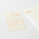 Ample margins and a simple, easy-to-use format. Starting December 2026 (14 months). This&nbsp;diary features a flexible monthly block format with ample margins, and a combination of 8-ruled and plain memo pages.


The MD paper offers excellent writing comfort and prevents bleed-through, even with a fountain pen. The flat-opening thread binding ensures a simple, high-quality diary that takes advantage of the quality of the material and inspires creativity with its streamlined design.&nbsp;MD paper is used no