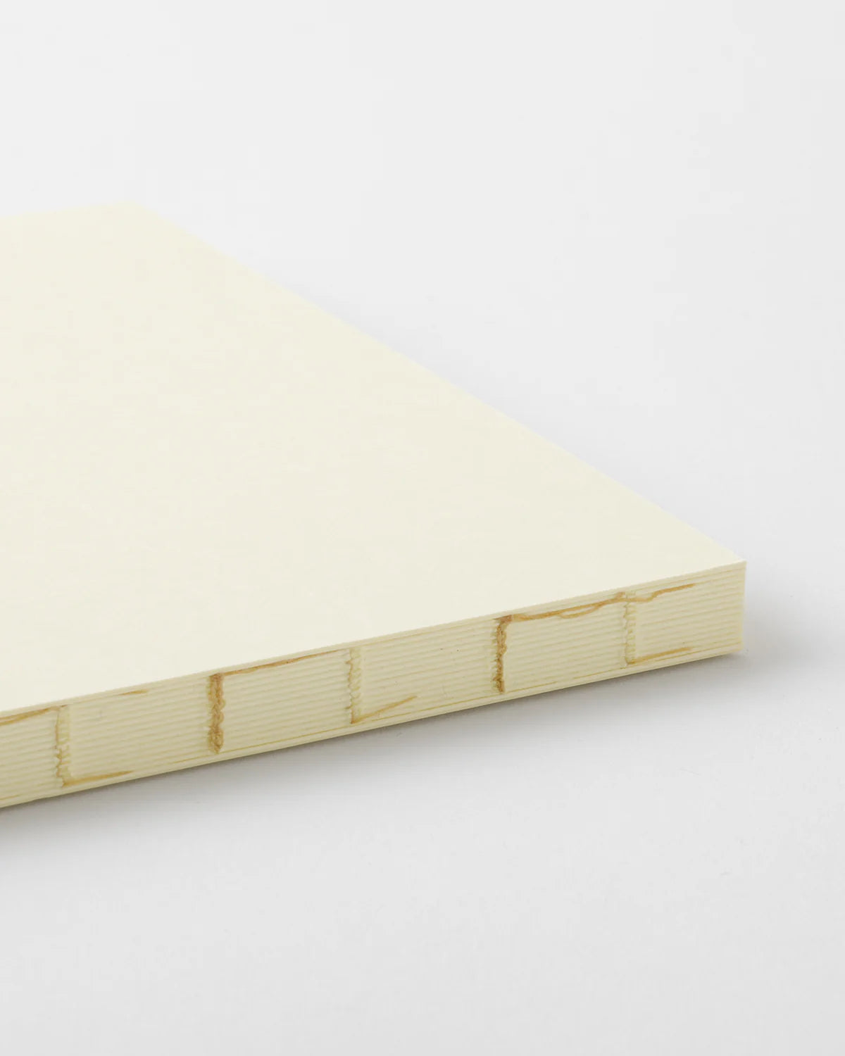 Crafted in Japan, this minimalist notebook is designed to enhance your writing experience. Inside, you'll find the high-quality Midori Diary (MD) paper, first developed in 1960 and refined ever since. Midori has rigorously tested this paper with various writing instruments to ensure quality, checking for ink feathering or bleeding, drying time, the smoothness of pen tips on the surface, and the tactile feel.