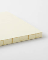 Crafted in Japan, this minimalist notebook is designed to enhance your writing experience. Inside, you'll find the high-quality Midori Diary (MD) paper, first developed in 1960 and refined ever since. Midori has rigorously tested this paper with various writing instruments to ensure quality, checking for ink feathering or bleeding, drying time, the smoothness of pen tips on the surface, and the tactile feel.