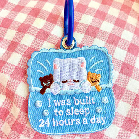 These cute embroidered keychains attach with a colorful ring clasp and are perfect for attaching to your keys or bag to bring with you on all of your adventures!

Includes one keychain only.
Embroidered on both sides. The design is the same on both sides.
Materials: Cotton, Polyester, Brass