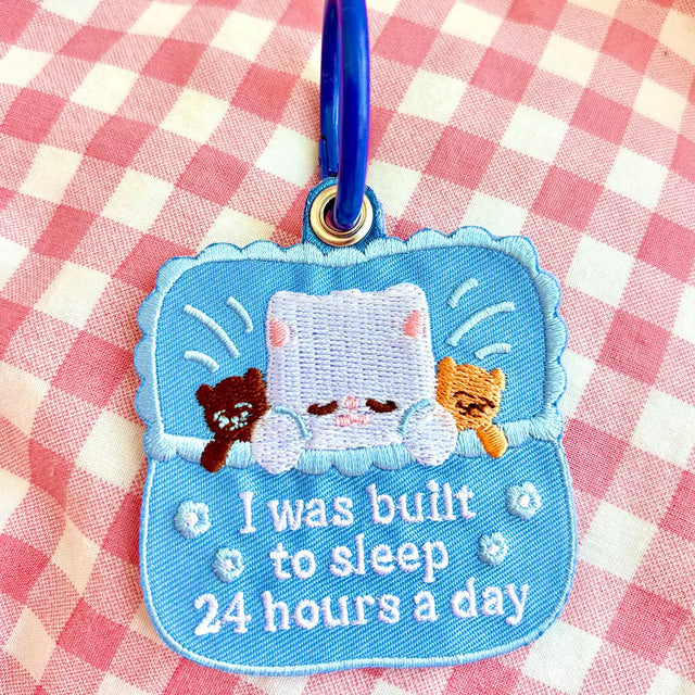 These cute embroidered keychains attach with a colorful ring clasp and are perfect for attaching to your keys or bag to bring with you on all of your adventures!

Includes one keychain only.
Embroidered on both sides. The design is the same on both sides.
Materials: Cotton, Polyester, Brass