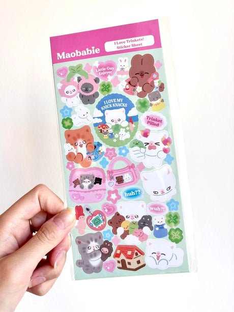As Maobabie, we present our Sticker Sheet -&nbsp;I Love Trinkets, crafted with love by our indie artist, Jennie. Printed on matte vinyl paper, this sheet measures 210mmx170mm, making it an ideal size for decorating your phone, laptop, or any other surface. Get ready to experience our cute and soft illustrations, bringing a touch of charm to your everyday items. With Maobabie, it's all about adding a dash of whimsy to your world.

Includes one (1) sticker sheet