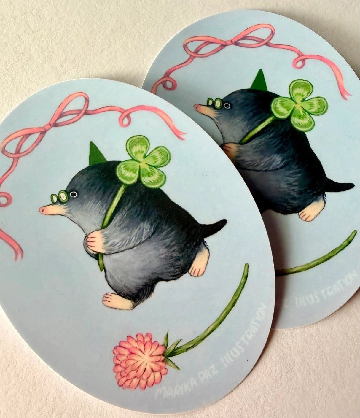 A very lucky mole takes their four-leaf clover home.

This vinyl matte sticker is weather and waterproof-stick it on a notebook, bike, or car- it's going to stick around! Heck, throw it on a water bottle and through the dishwasher. This sticker can go anywhere. Sticker measures 3.25" x 4.5" Printed in USA.
