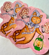 A cat and his lantern attract moths as they float amongst the stars.

This vinyl matte sticker is weather and waterproof-stick it on a notebook, bike, or car- it's going to stick around! Heck, throw it on a water bottle and through the dishwasher. This sticker can go anywhere. Sticker measures 3.5" x 4.5" Printed in USA.