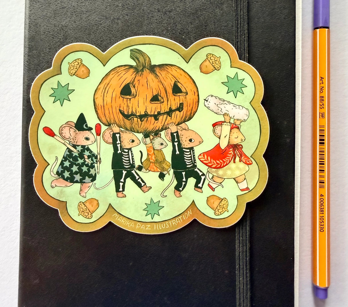 A halloween parade brings out the Jack-o-lantern!

This vinyl matte sticker is weather and waterproof-stick it on a notebook, bike, or car- it's going to stick around! Heck, throw it on a water bottle and through the dishwasher. This sticker can go anywhere. Sticker measures 4." x 4.5" Printed in USA.