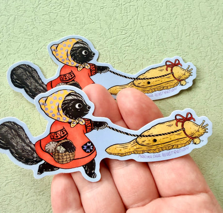 This Skunk and Slug are going for a walk.

This vinyl matte sticker is weather and waterproof-stick it on a notebook, bike, or car- it's going to stick around! Heck, throw it on a water bottle and through the dishwasher. This sticker can go anywhere. Sticker measures 4.74" x 2.75" Printed in USA.