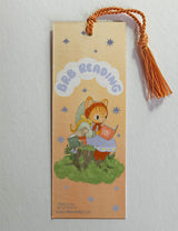 Marika Paz Illustration - BRB Reading Bookmark

Three little friends read together. Be Right Back, Reading! Same artwork on both sides.

Printed on heavy cardstock and comes with a tassel, these bookmarks measure 2x6 inches.

Printed in USA