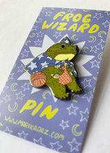 Marika Paz Illustration - Frog Wizard Enamel Pin

A Frog Wizard knits up some spells. This Frog Wizard is a hard enamel pin.

This pin measures approximately 1.50" and features a clasp for easy closure.

The metal outline color is black/gray