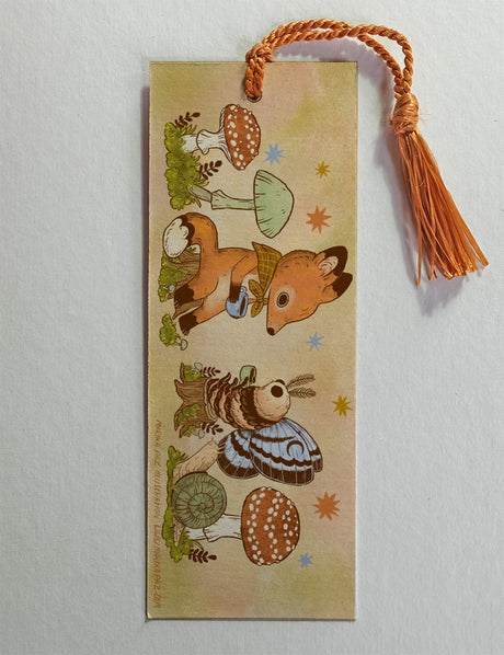 Marika Paz Illustration - Tea Time Bookmark

Two friends sit down for tea. Same image on both sides.

Printed on heavy cardstock and comes with a tassel, these bookmarks measure 2x6 inches.&nbsp;

Printed in USA