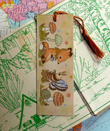 Marika Paz Illustration - Tea Time Bookmark

Two friends sit down for tea. Same image on both sides.

Printed on heavy cardstock and comes with a tassel, these bookmarks measure 2x6 inches.&nbsp;

Printed in USA